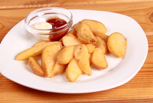 coocked potatot with ketchup isolated