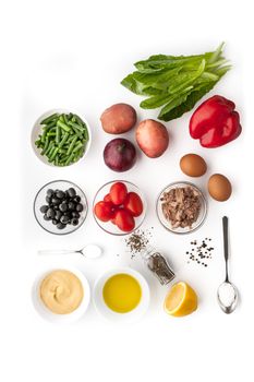 Ingredients for Nicoise salad on the white background