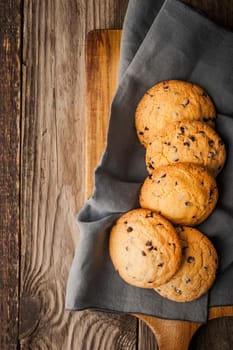 Chocolate chip cookies on the wooden table top view