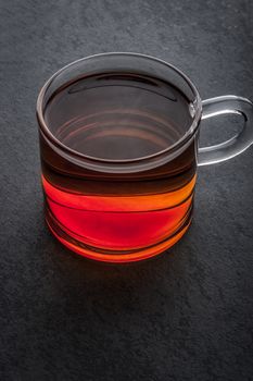 Cup of tea on the dark stone table