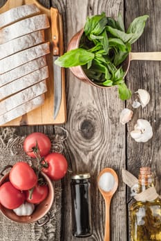 Ingredients for  bruschetta on the wooden table top view