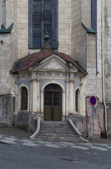 Side entrance to the church of Saint Catherine in the former mininig city Banska Stiavnica, Slovakia, which is part of UNESCO World Heritage Site.