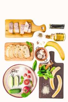 Ingredients for tartines on the white background vertical