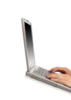 Businessman typing on a notebook