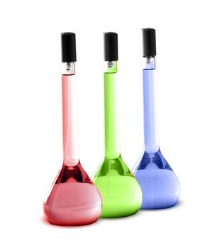 Laboratory glassware with liquids of different colors