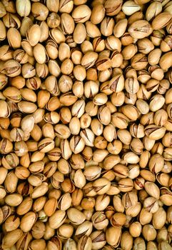 Pile of pistachio nuts close up