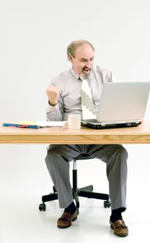 Businessman watching sport scores on the computer during working hours.