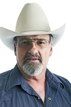 Mature male wearing a cowboy hat and eye glasses.