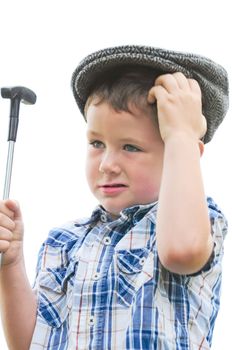 Cute little boy wondering how he messed up that last putt.
