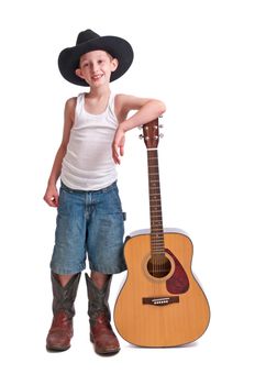 Cute young man with a cowboy hat and oversize boots