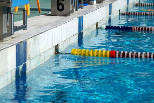 Dividers of paths in the big outdoor swimming pool