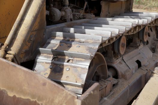 Big steel caterpillars of the excavator or bulldozer