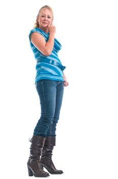 Pretty blonde woman looking down from a low angle view. Isolated on a white background.