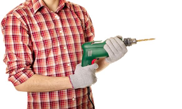 hands handling an electric drilling machine