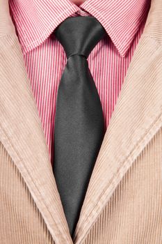 Close-up of red striped shirt with black tie