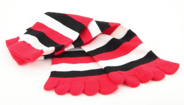Multicolor child's striped socks isolated