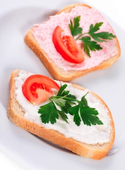 toast with tomato and fish caviar cream