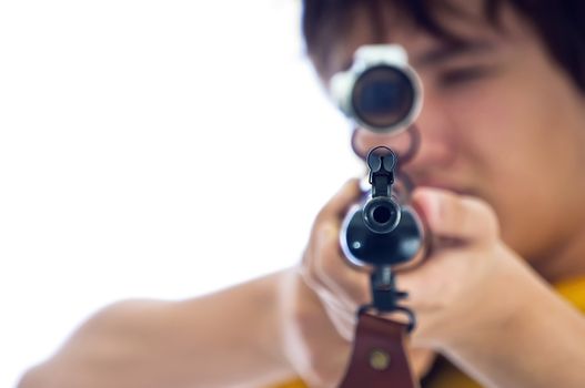 Rifle barrel and front sight in clear focus from a 30-06 hunting rifle. Camera on a tripod fired remotely.