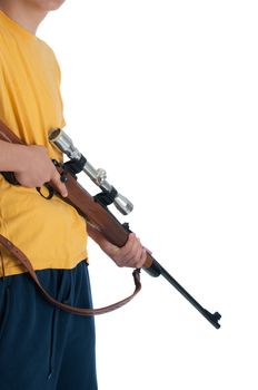 Teenage boy holding a high power hunting rifle.