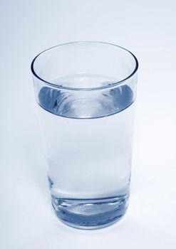 Glass with water on white background