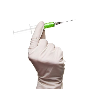 Hand holding syringe isolated on white