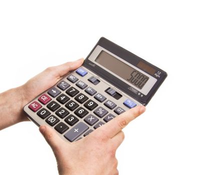 Male businessman using a calculator