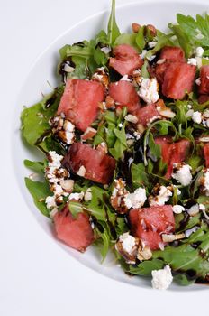 Arugula salad, ricotta cheese with watermelon slices,  balsamic soy sauce