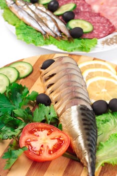 sliced herring on wooden plate