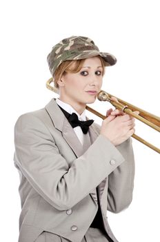A pretty woman posing with a military hat and tuxedo.
