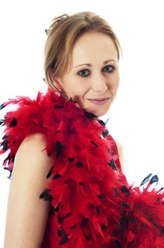 Pretty young woman looking sexy in a red dress and boa. Isolated on a white background.