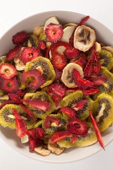 Different varieties mix of dried fruits in white plate