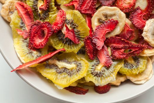 Different varieties mix of dried fruits in white plate