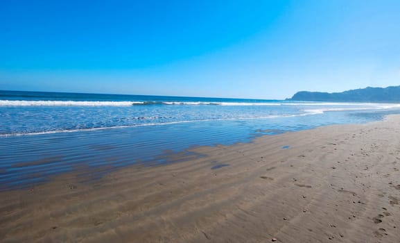 tropical beach with blue sky