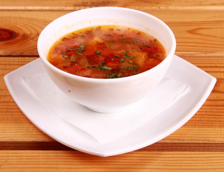 Bowl of Bright Red Creamy Tomato Soup with Yogurt