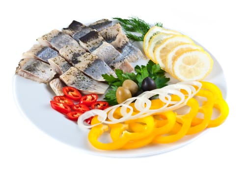 fish on plate with vegetables