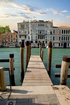 Small wooden jetty on Grand Canal in Venice