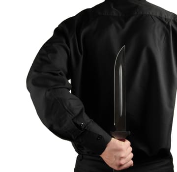 standing man in black with knife for backs