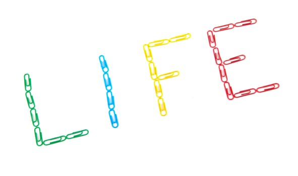 word "life" made with multicolored paper clips