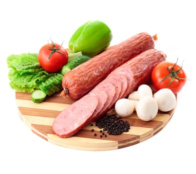 sausage on plate with vegetables