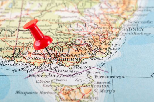 Red push pin showing the location of a destination point on a map. Australia - Melbourne