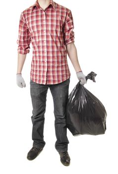 Man holding black plastic trash bag