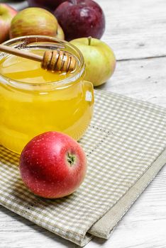 Still life with apples and honey to the August holiday