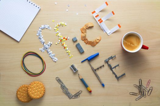 Office life inscription on a wooden desk laid out of stationery. Clerk's weekdays. Daily routine