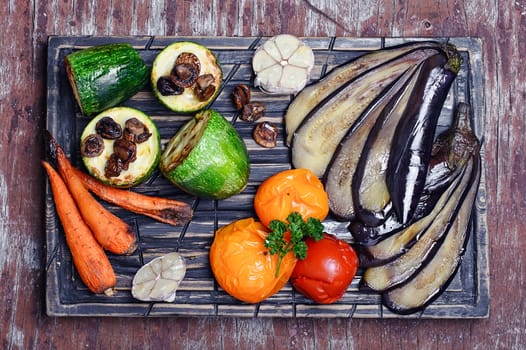 Roasted summer vegetables on the kitchen cutting board