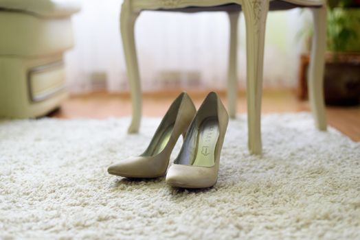 women's shoes on the floor on the carpet