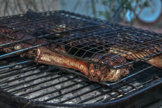 horizontal image smoked steak on barbeque