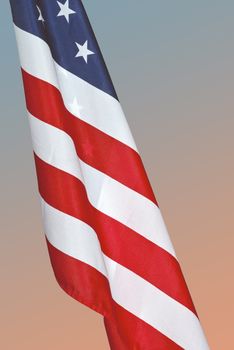 American flag isolated with a clipping path against a morning gradient.