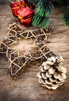 Christmas decorations and gifts on a background of pine branches