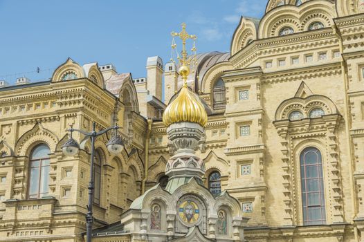 beautiful Christian church in St. Petersburg with golden domes and crosses