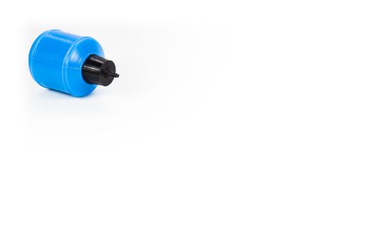 plastic blue  glue container fallen isolated on white
